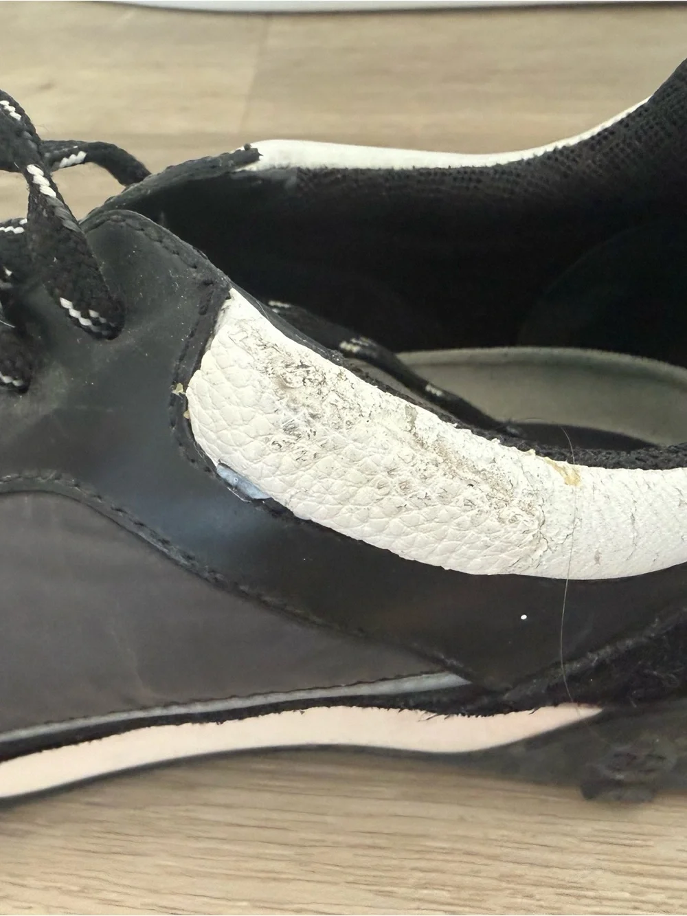 CHANEL Black and White Men’s Logo Running Sneakers